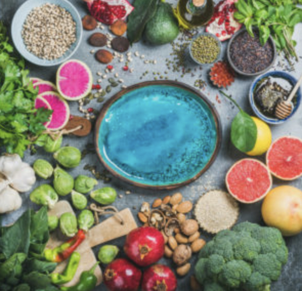 Fresh whole foods arranged for a nutrition plan